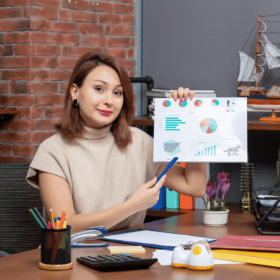 front-view-pretty-woman-showing-diagrams-working-office